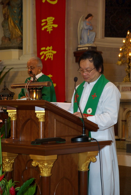 Monsignor giving address