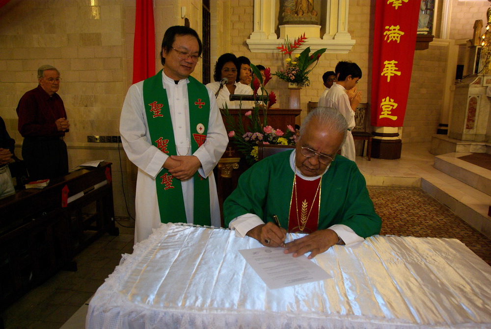 Bishop signing