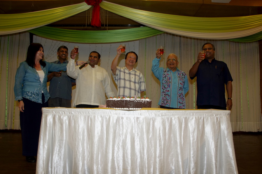 Fr Liew, Bishop Antony and Priests toasting