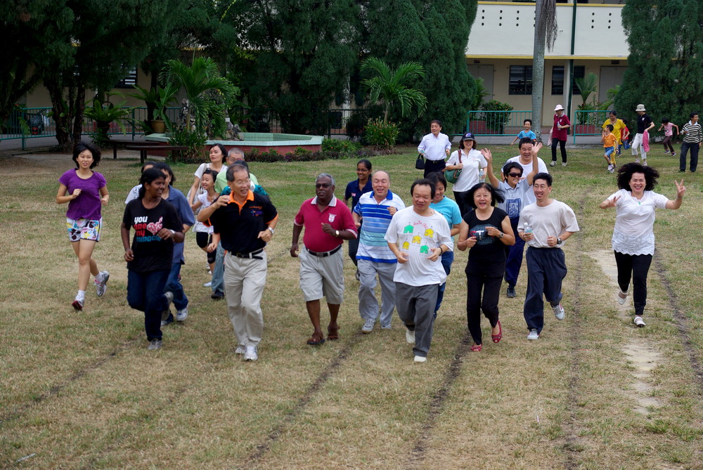 Fr Liew leads SMC parishioners in jogging