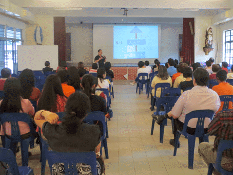 Fr Liew addressing the crowd