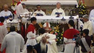 Bishop Sebastian hugging Fr Anthony Liew