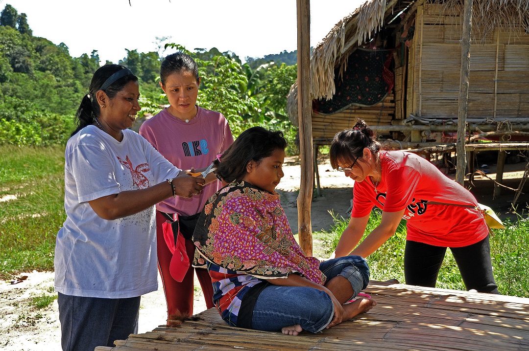 Haircut and lice treatment in Kg Karah