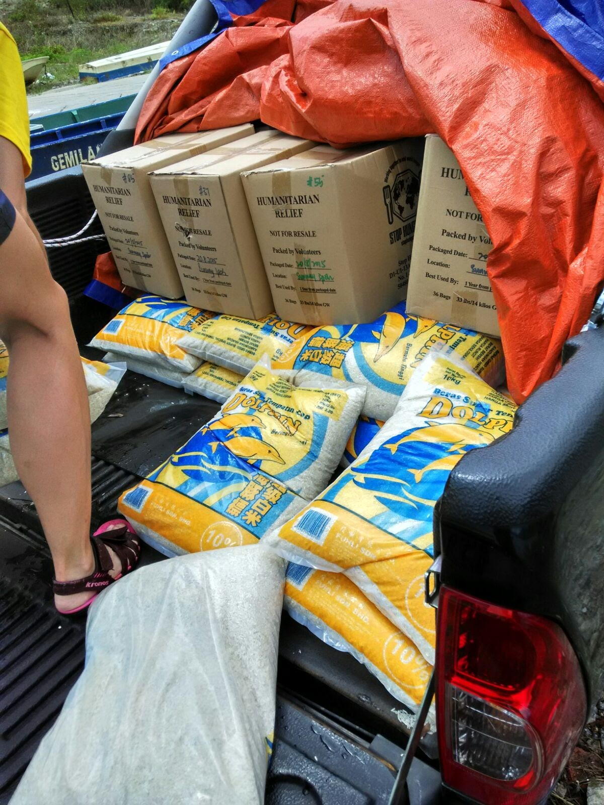 Delivery of rice for flooded orang asli village in Pos Kemar