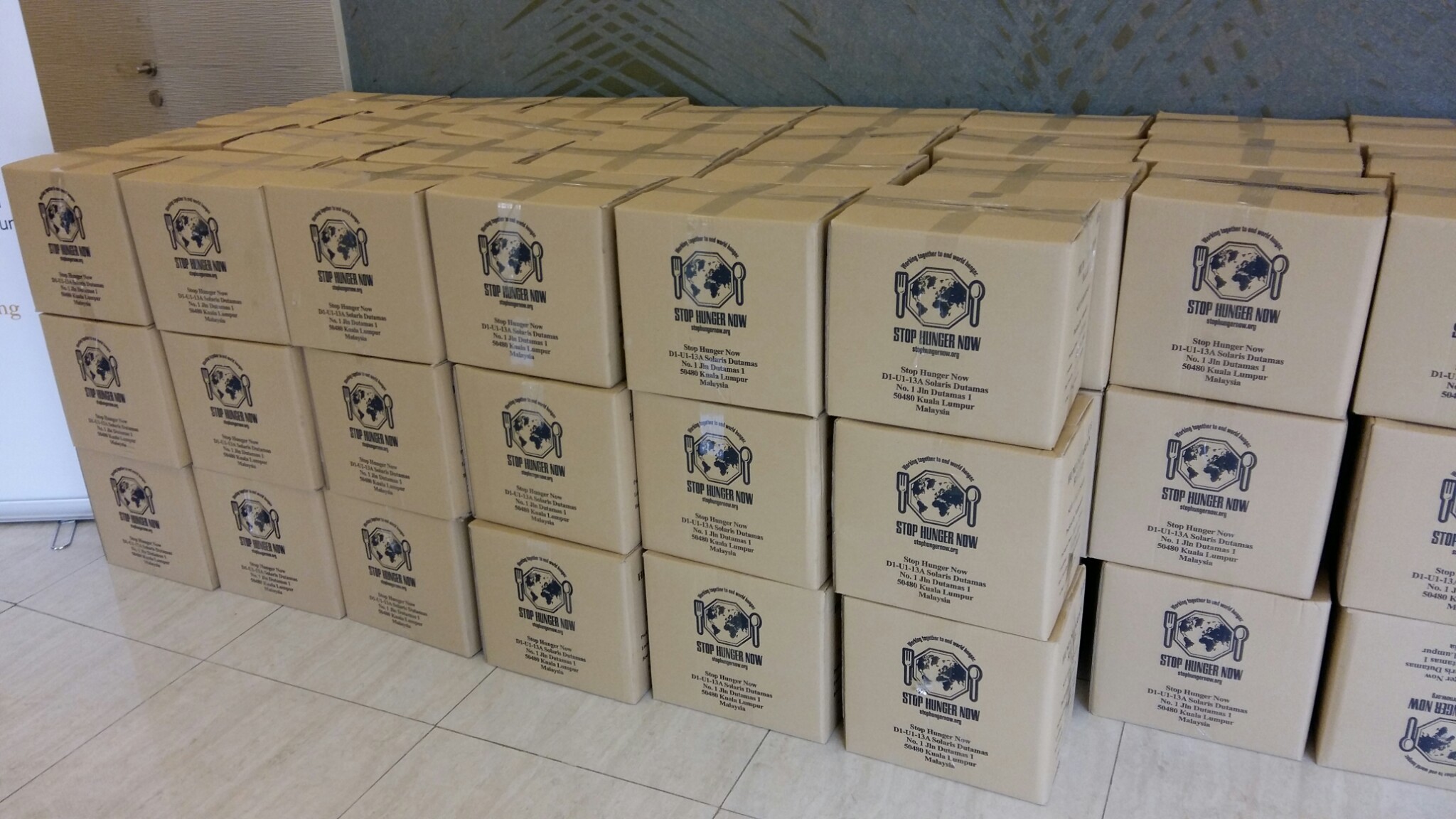 Stop Hunger Now fortified rice packs in boxes