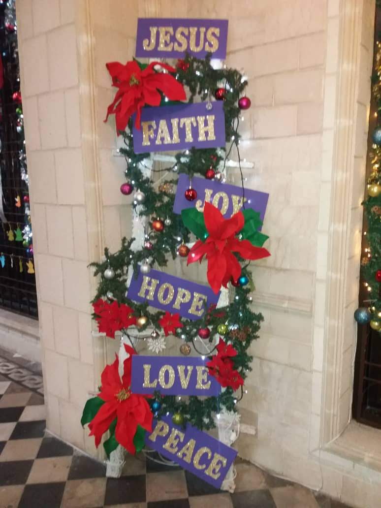Volunteers decorating the church for Christmas