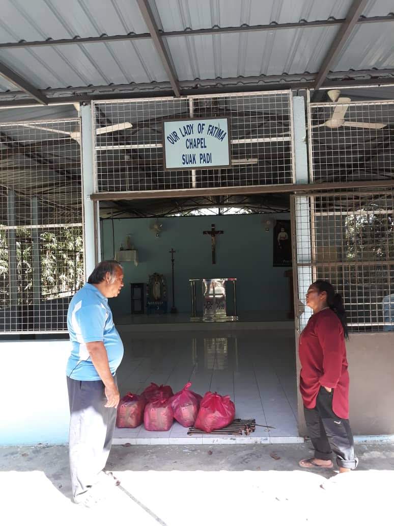 SOA's Bernard Lee delivering regular food aid to Kg Suak Padi OA community