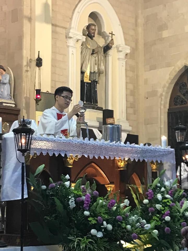 Fr Anthony Liew celebrating Easter Vigil mass in 2019