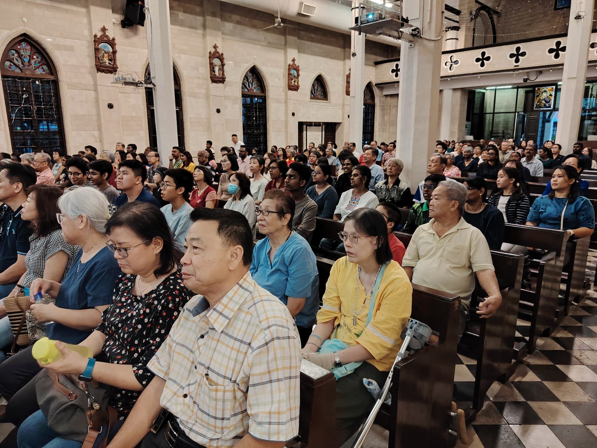 SMC congregation attending Bruce Kuhn performance