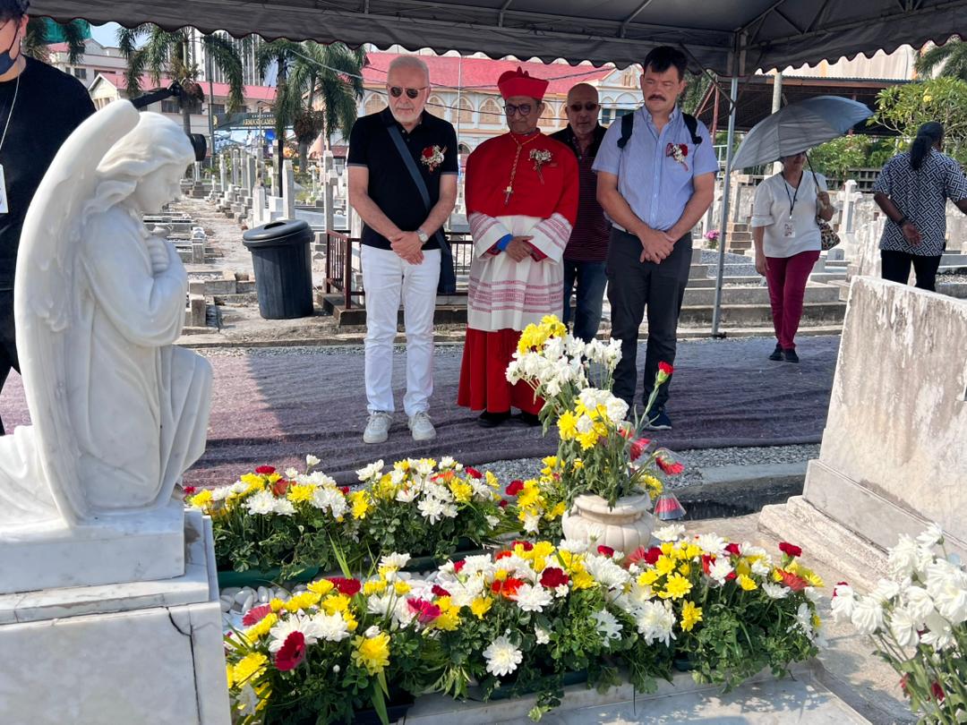 At gravesite of Sybil Kathigasu