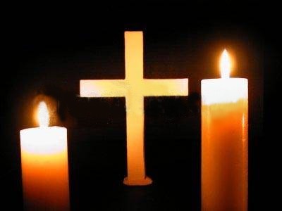Cross and candle graphic