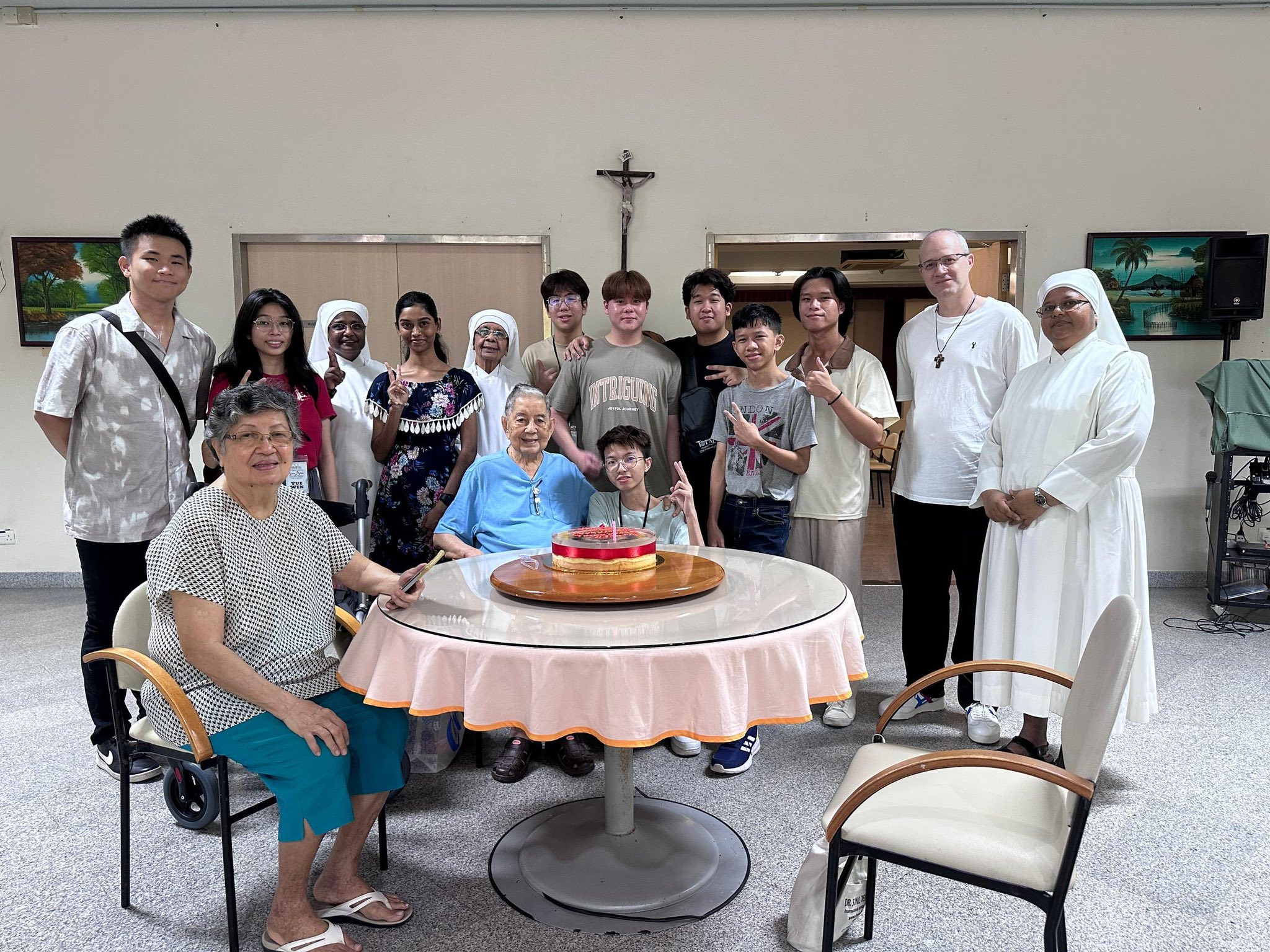 6 of the SMC Youth from Glow to Grow programme with Fr Aloysius, Brother Daniel and other youth volunteering for outreach to Little Sisters of the Poor in Penang